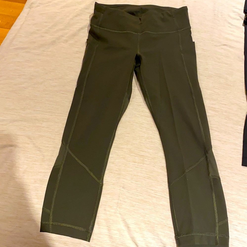 Lululemon cropped army green tights, size 4. Lightly worn, no more than 3 times